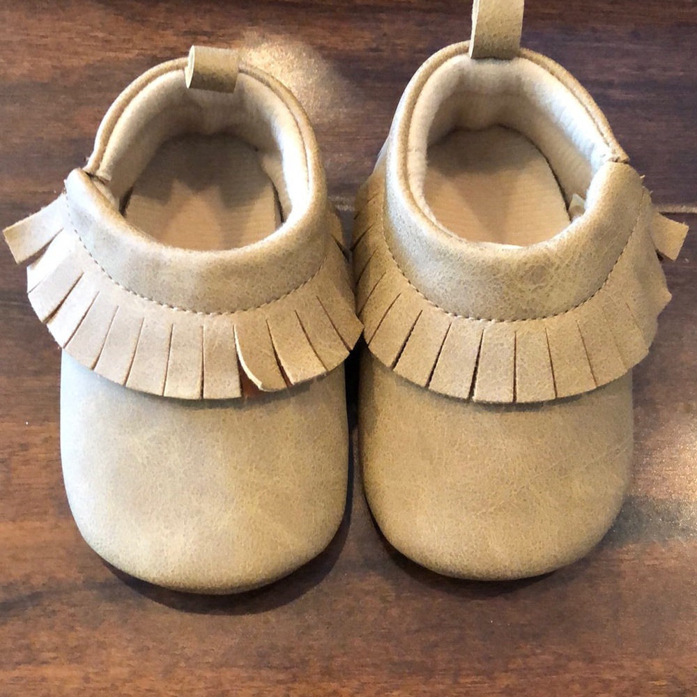 Baby brown “tan” moccasins.